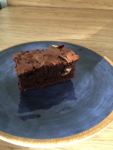 Chocolate brownie, sitting on a plate